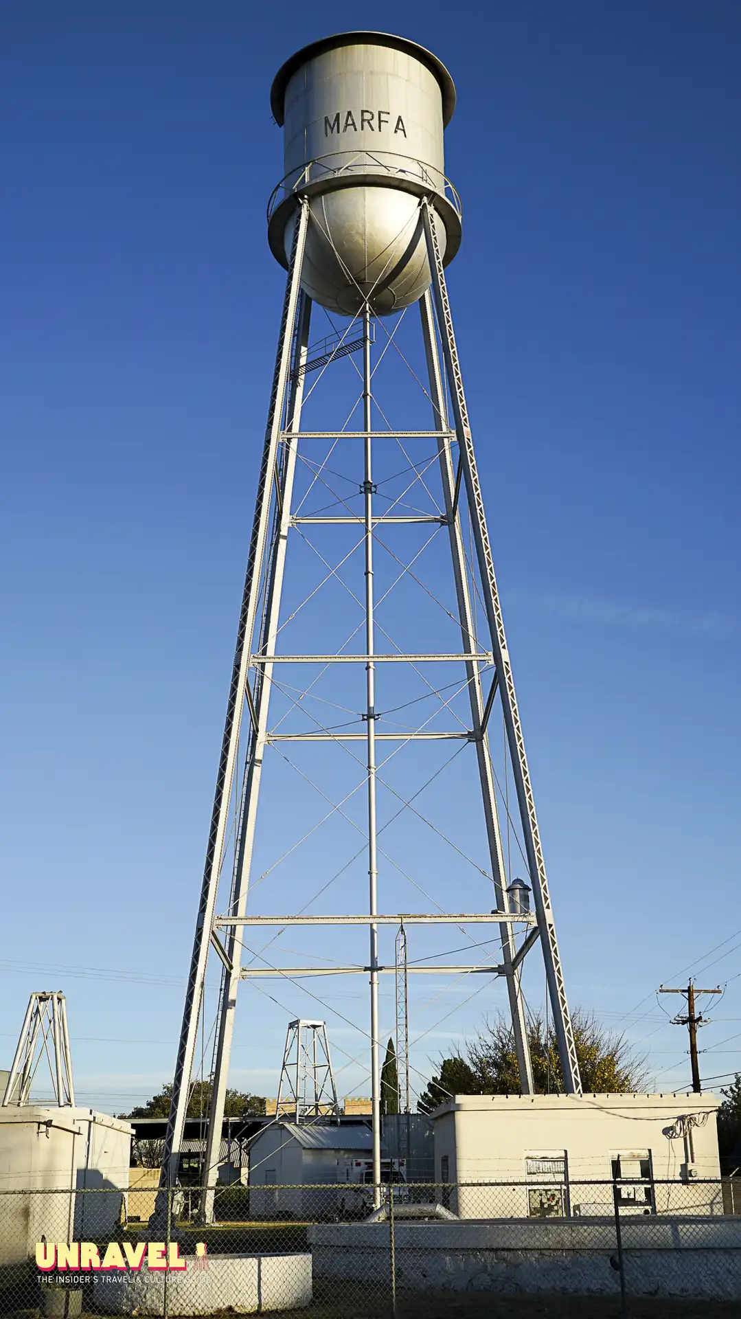 Marfa water tower against a blue West Texas sky